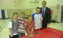 Trent Wotherspoon with students and tiles at Shannen\'s Dream